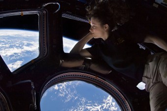 1280px-Tracy_Caldwell_Dyson_in_Cupola_ISS