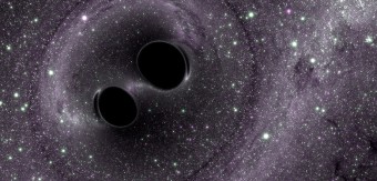 Rappresentazione artistica di due buchi neri in fase di coalescenza. Crediti: The SXS (Simulating eXtreme Spacetimes) Project