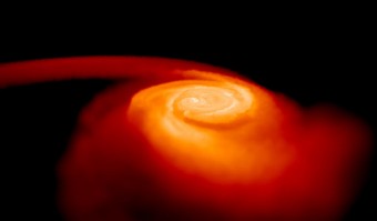 Nell’illustrazione una rappresentazione di due stelle di neutroni che si fondono tra loro. Questi processi sono tra i candidati più forti per la formazione di elementi pesanti nell’Universo. Crediti: Stephan Rosswog, Jacobs University di Brema.