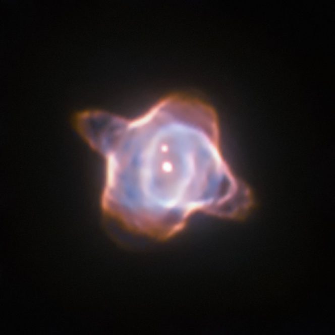 This image of the Stingray nebula, a planetary nebula 2400 light-years from Earth, was taken with the Wide Field and Planetary Camera 2 (WFPC2) in 1998. In the centre of the nebula the fast evolving star SAO 244567 is located. Observations made within the last 45 years showed that the surface temperature of the star increased by almost 40 000 degree Celsius. Now new observations of the spectra of the star have revealed that SAO 244567 has started to cool again. CREDIT ESA/Hubble & NASA