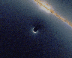 Nell'animazione, l'effetto "zoom" di una lente gravitazionale (in questo caso, un buco nero) deforma la galassia che si vede transitare sullo sfondo producendo un anello di Einstein. Crediti: Wikimedia Commons